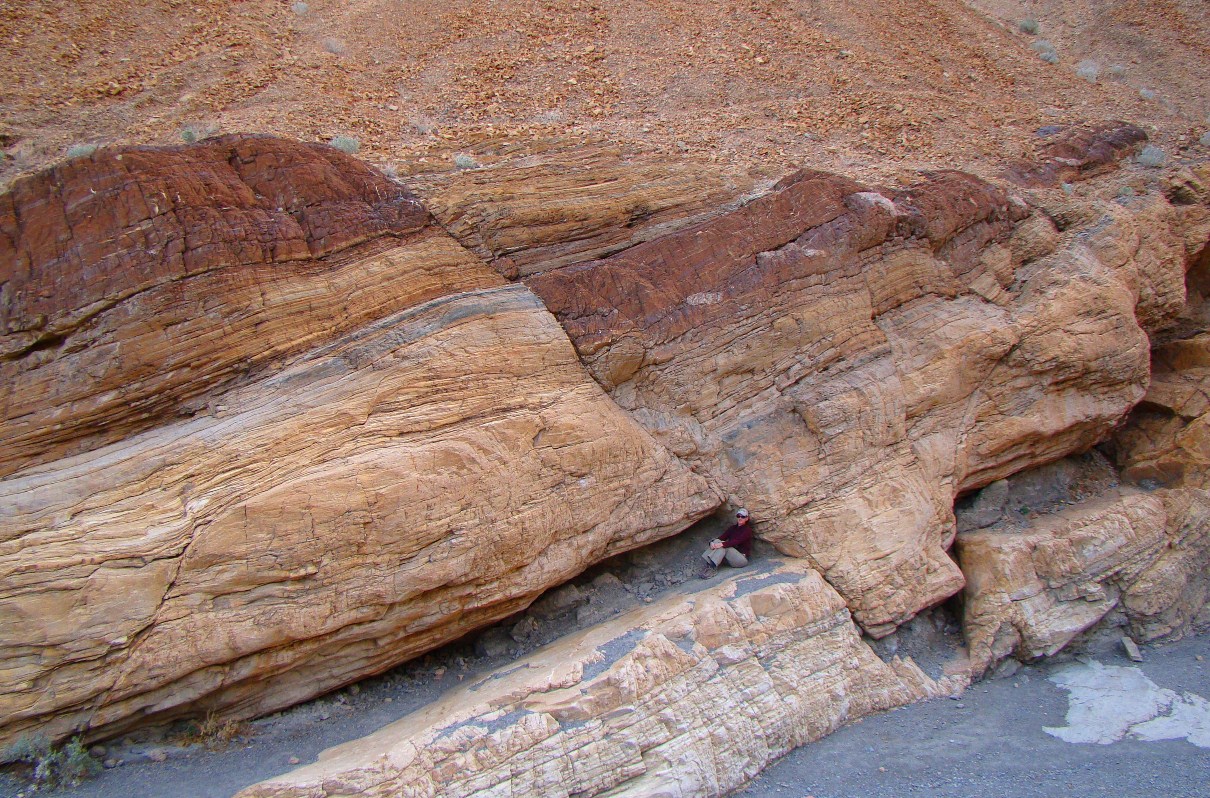 Normal fault offsetting layers in the Noonday Dolomite, Mosaic Canyon, Death Valley, California. With permission by: Garry Hayes and Susan Hayes from: http://geotripperimages.com/images/DSC01776%20Normal%20fault%20in%20Mosaic%20Canyon.jpg